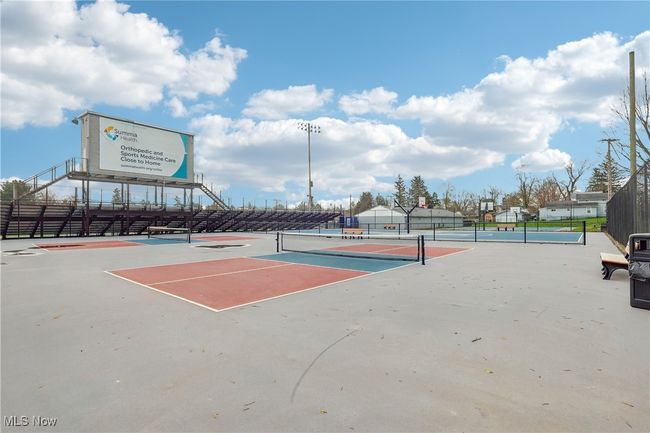 View of tennis court with fence | Image 36