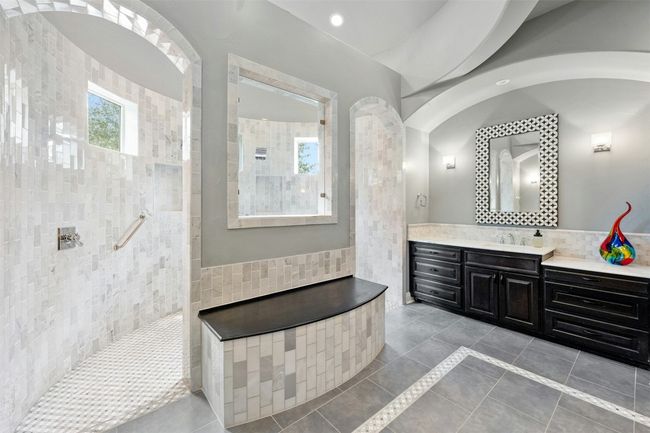 Owners can easily add their own soaking tub with the plumbing just under the bench. | Image 24