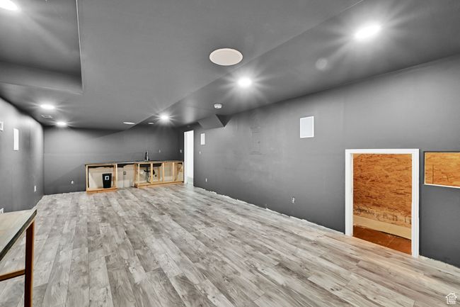 Basement with recessed lighting and wood finished floors | Image 37