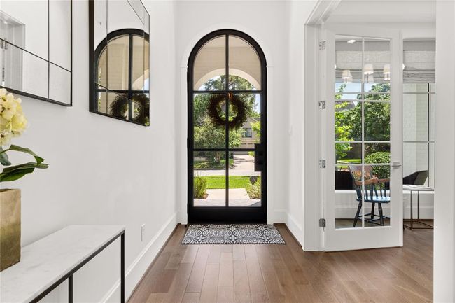 Arched glass & iron front door | Image 7