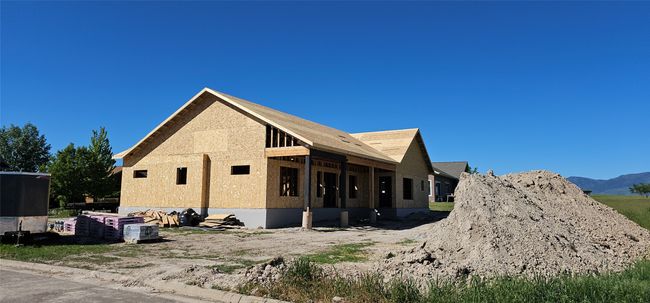 Rear view of house with a mountain view | Image 27