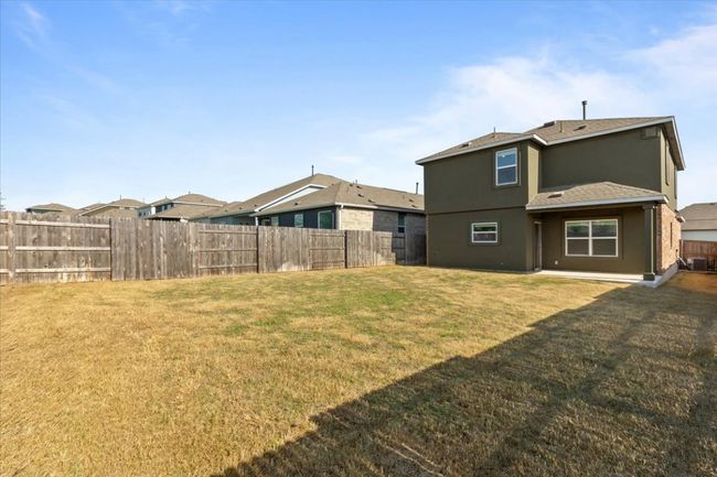 View of yard with a fenced backyard | Image 20