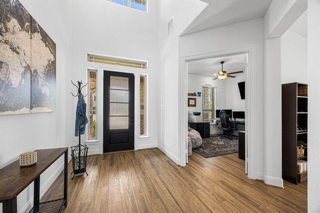 Soaring entryway ceiling to greet you home each day. | Image 9