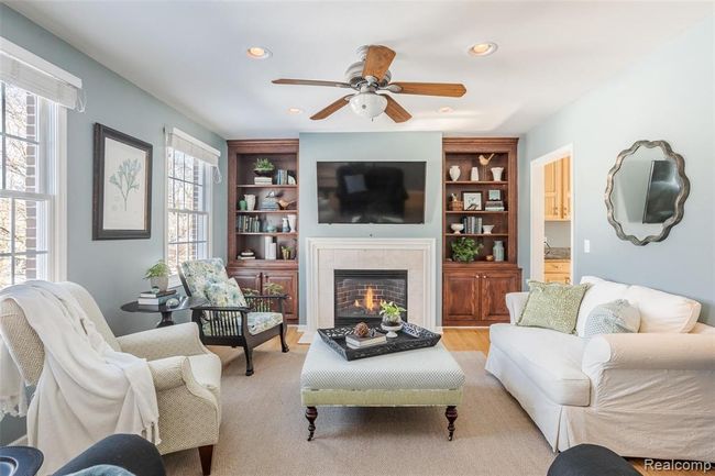 Living Room with Gas Fireplace & Built-In Bookcases. | Image 12