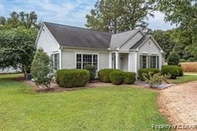 View of front of house featuring a front lawn | Image 1