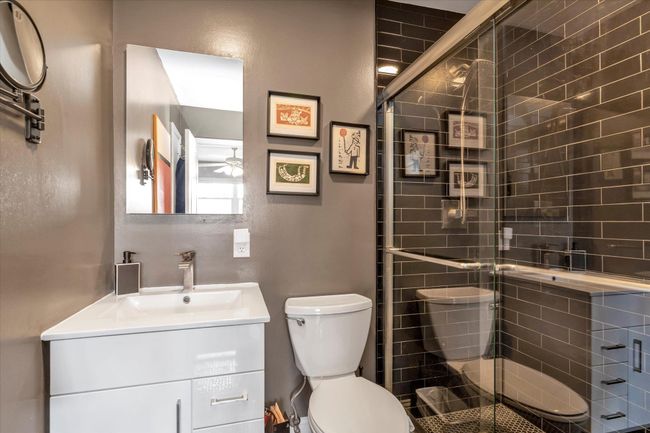 Full bath with toilet, a shower stall, and vanity | Image 14