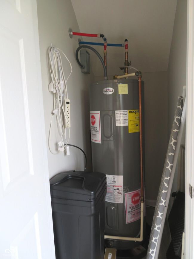 Water heater and water softener salt tank. | Image 19