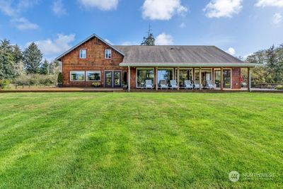 Located out of the population of Hoquiam towards the west ; This amazing custom home has all the space needed for large gatherings and private events. With four bedrooms and four bathrooms and a large amount of very usable outdoor space, this land can accommodate multiple large RVs and tent camping as well. The large grounds, large outdoor kitchen and permanent outdoor restroom facilities provide the perfect setup for endless possibilites in the area of hospitality ! | Image 2