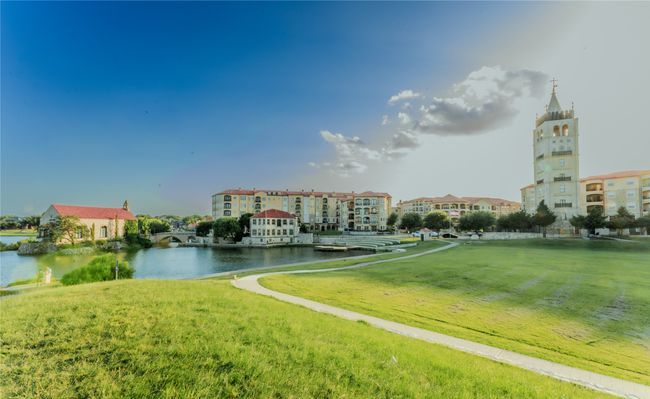 View of community with a water view and a lawn | Image 4