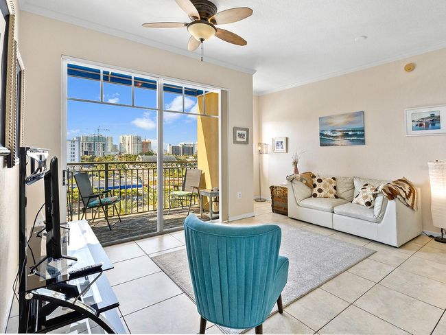 living room, with dinette area or office cubby window | Image 12