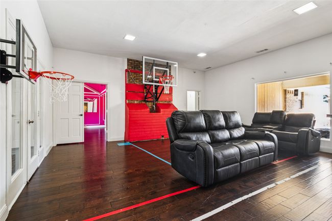 Living area featuring hardwood / wood-style flooring | Image 11