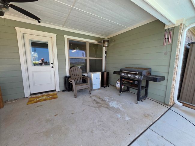 View of patio / terrace with a grill and ceiling fan | Image 36