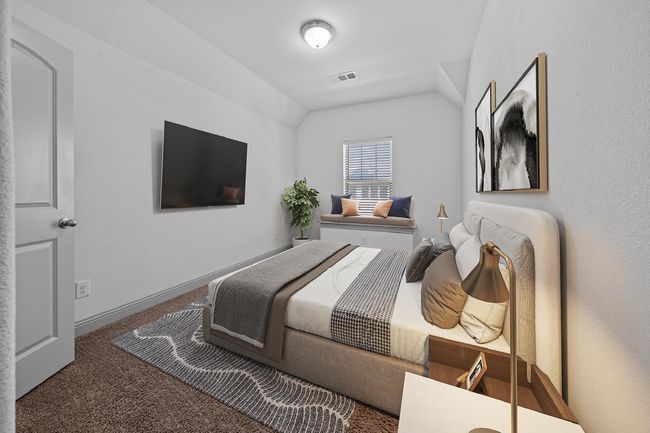 Carpeted bedroom featuring lofted ceiling and visible vents | Image 18