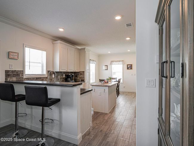 623 Hyacinth Cir, House other with 3 bedrooms, 2 bathrooms and null parking in Barefoot Bay FL | Image 9