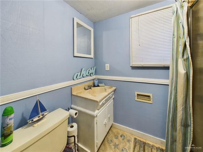 Bathroom with vanity and toilet | Image 18