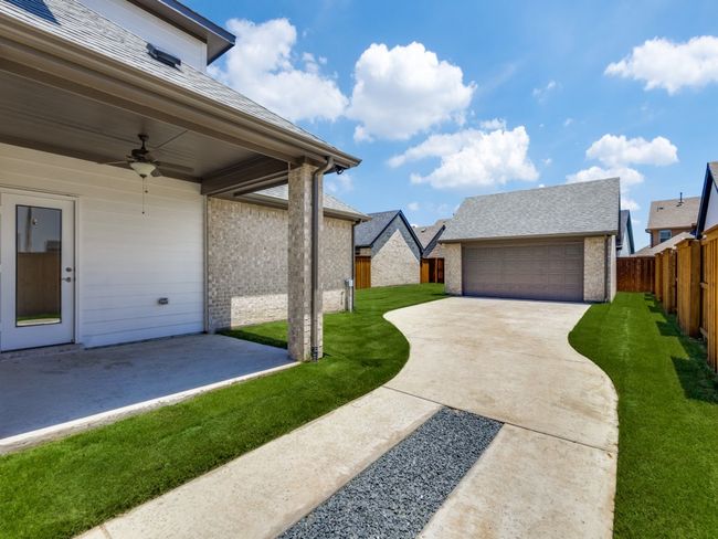 This wonderful home offers a detached, 2 car garage with extra long drive allowing for plenty of private parking space. | Image 17