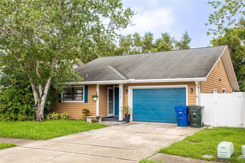 1713 Whispering Dr E, LARGO, FL, 33771-3967 | Card Image