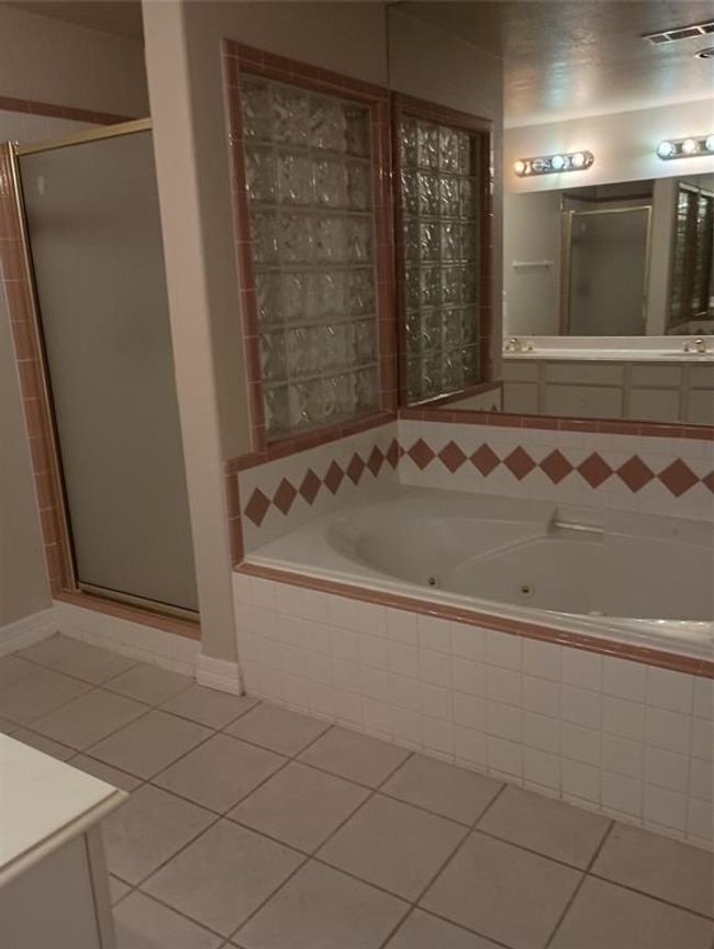 Primary Bathroom with separate shower and bathtub | Image 11
