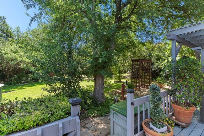 View of yard featuring a pergola | Image 34