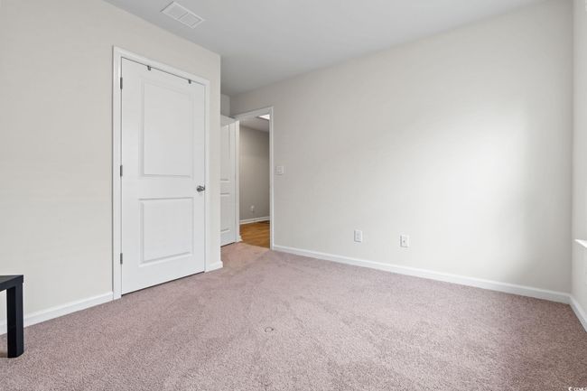Unfurnished bedroom featuring carpet floors | Image 23