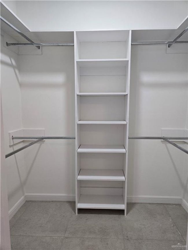 View of spacious closet | Image 12