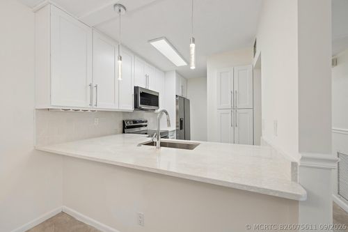 21a-3404 Gardens East Dr, Palm Beach Gardens, FL, 33410-4964 | Card Image