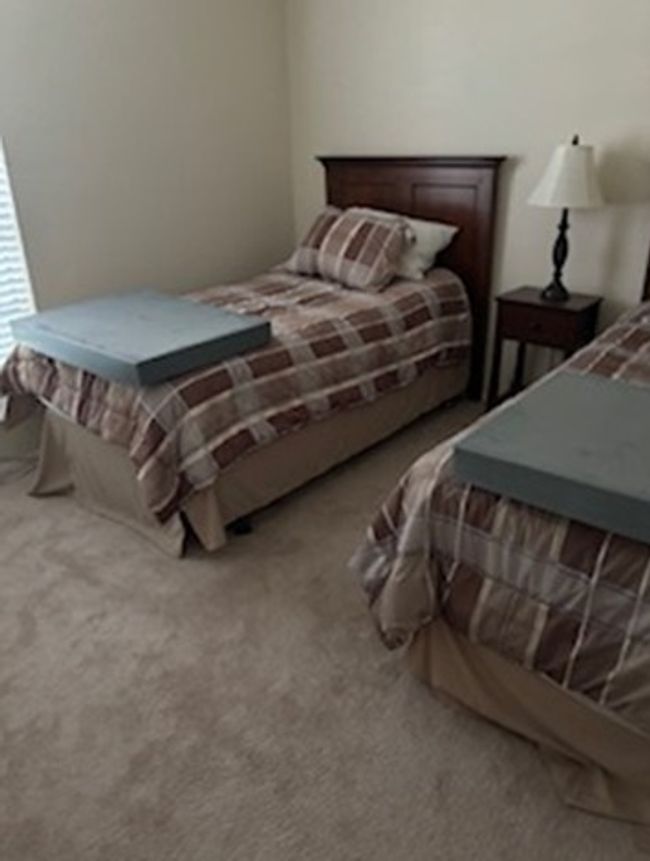 Bedroom featuring carpet | Image 5
