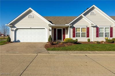 Ranch-style house with a garage | Image 1