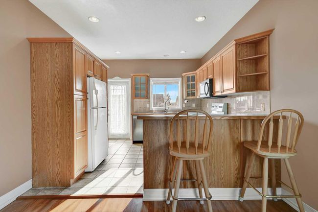 12301 Crystal Lake Dr, House detached with 4 bedrooms, 3 bathrooms and 6 parking in Grande Prairie AB | Image 12