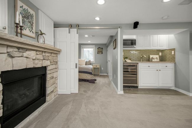 Lower level family room w/fireplace | Image 31