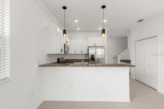 7018 Ripple Pond Loop, Townhouse with 3 bedrooms, 3 bathrooms and null parking in ZEPHYRHILLS FL | Image 15