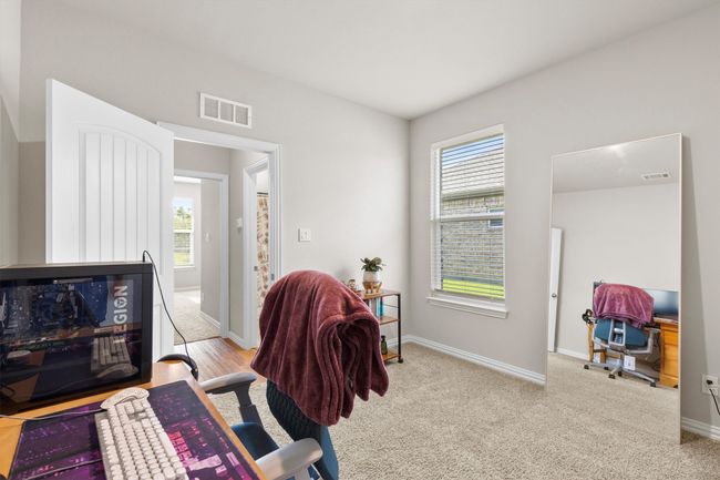 Home office featuring baseboards and carpet | Image 25