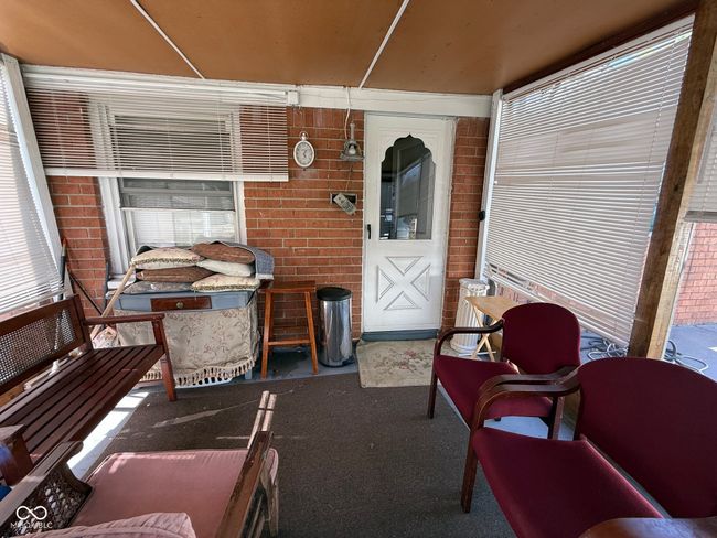 Enclosed back porch. | Image 7
