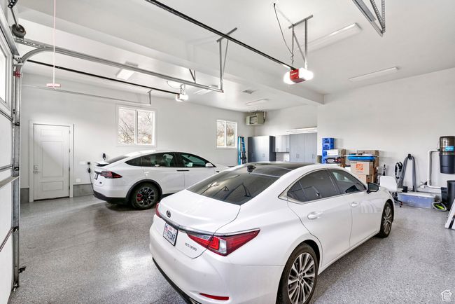 Garage with a garage door opener | Image 124