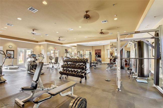 Gym featuring recessed lighting and a ceiling fan | Image 78