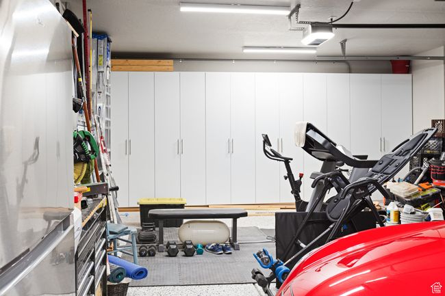 Garage featuring a garage door opener | Image 41