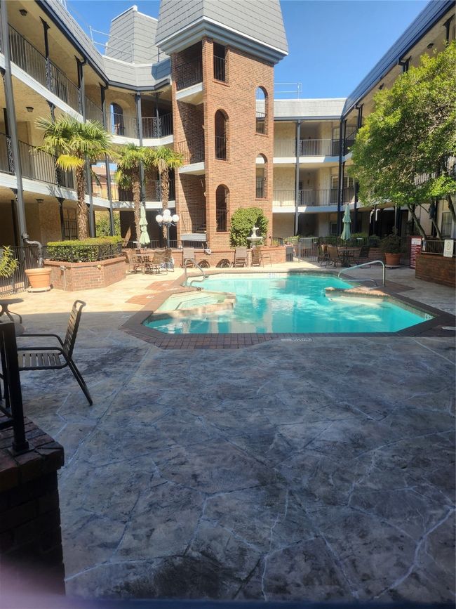 Pool featuring a patio area | Image 5