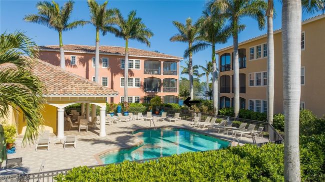 View of swimming pool with a patio area | Image 24