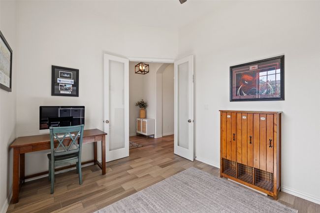 Generous office space right off the foyer, offering both convenience and quiet for remote work or study. | Image 7