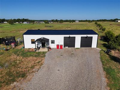 Garage featuring a rural view | Image 2