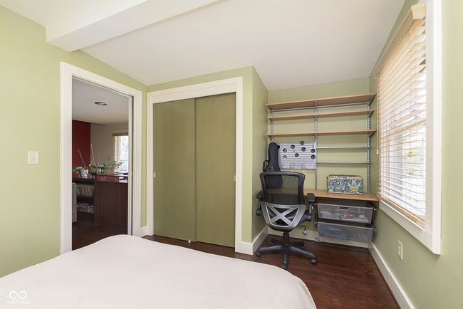 Primary bedroom on the main floor has built-ins and possible office space! | Image 15