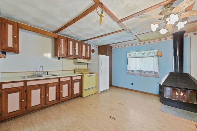 1 Bedroom Apartment. Includes, Free standing Fireplace, and Refrigerator. | Image 29