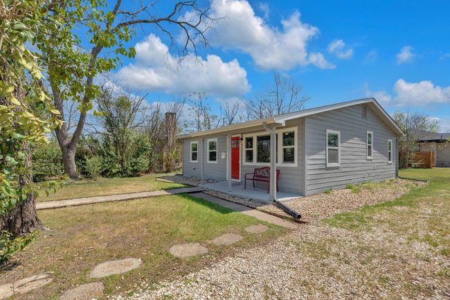 Single story home with a front lawn and a patio | Image 4