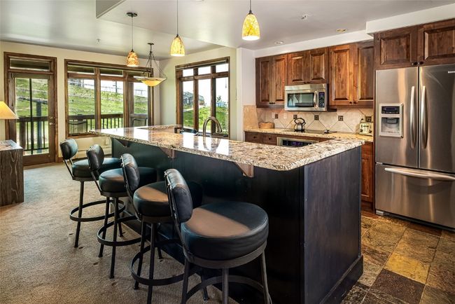 Kitchen with brand new appliances | Image 4
