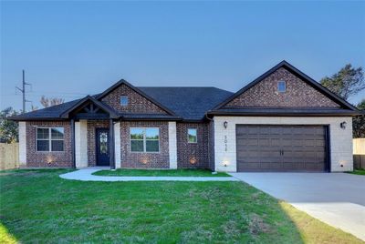 Model home is 5012 Moss Rock Trail - photo is representation of final build | Image 1