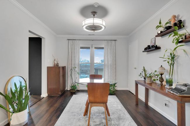 Office area with baseboards, ornamental molding, and wood finished floors | Image 11