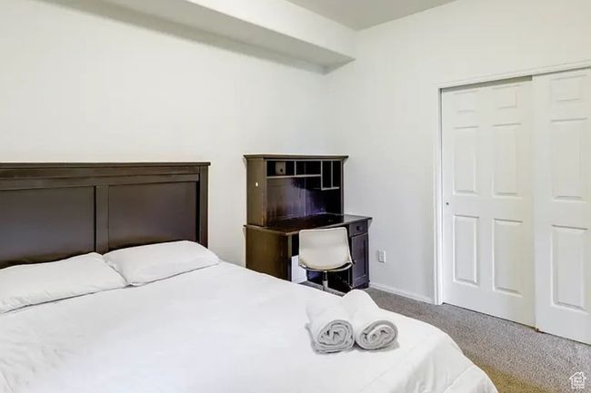 Carpeted bedroom featuring baseboards and a closet | Image 18