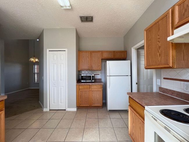 340 Cimarron Ct, House other with 4 bedrooms, 3 bathrooms and null parking in POINCIANA FL | Image 17