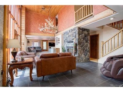 8791 Grizzly Way, House other with 3 bedrooms, 2 bathrooms and null parking in Evergreen CO | Image 2