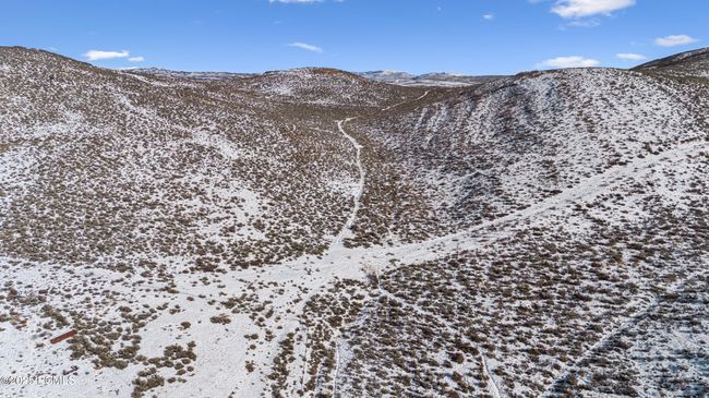 This property backs up to Round Valley – 2, 200 acres of open space. | Image 77